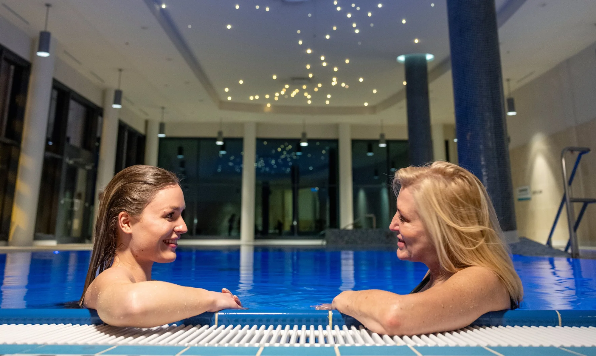 Mom and Daughter in Pool